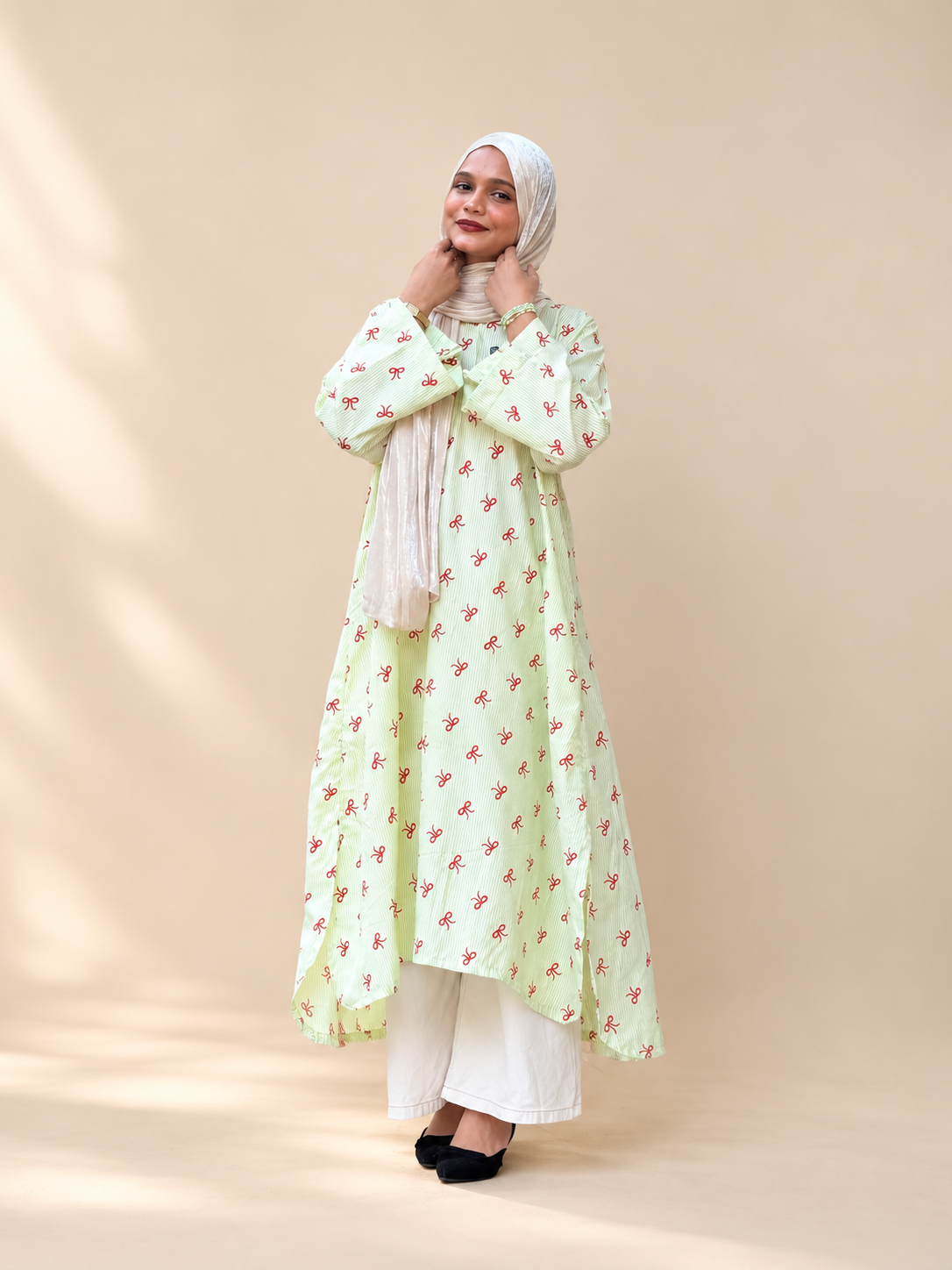 Stripes with a touch of bows Long kurti