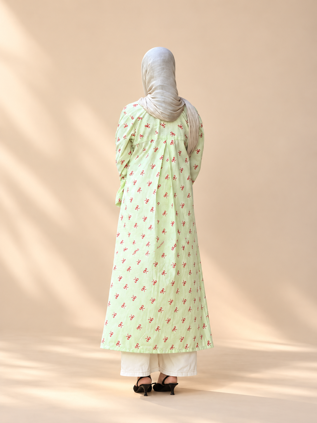 Stripes with a touch of bows Long kurti