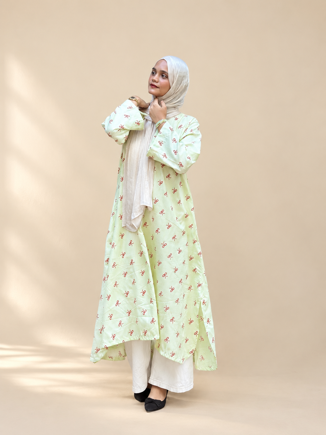 Stripes with a touch of bows Long kurti