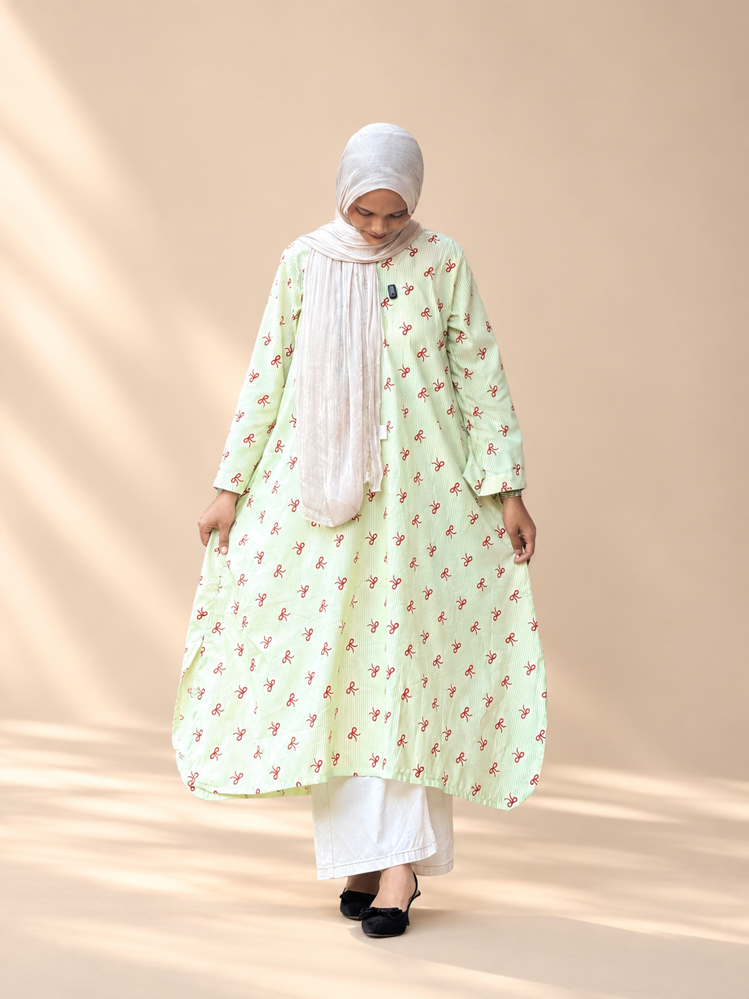 Stripes with a touch of bows Long kurti