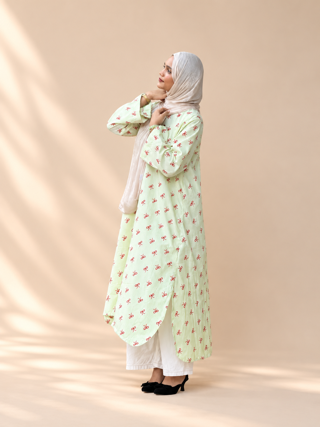 Stripes with a touch of bows Long kurti
