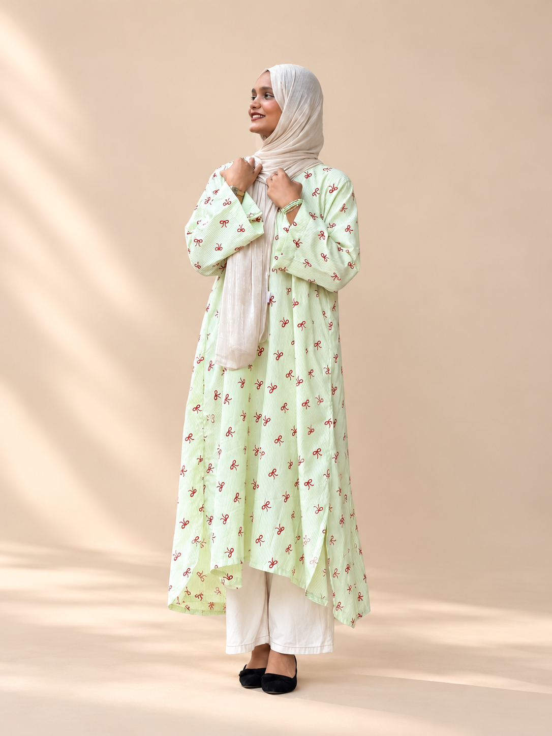 Stripes with a touch of bows Long kurti